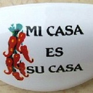 May include: White ceramic dish with a red chili pepper design and the text "Mi Casa Es Su Casa".