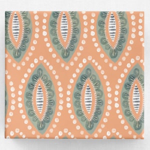 May include: A square, patterned design featuring a repeating motif of stylized oval shapes in teal and white against a peach background. The design includes white dots and striped details, creating a symmetrical pattern.