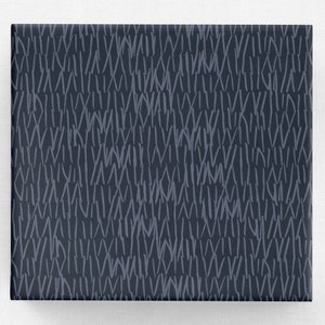 May include: Dark blue wrapping paper with a white abstract pattern of lines and dashes.