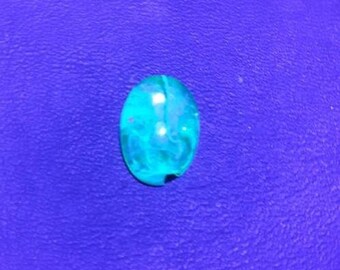 1,7 Ct. Gemmy Cabochon Hyalite Opal Fluorescent. Zacatecas, Mexiko