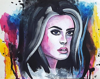 May include: A watercolor portrait of a woman with black and white hair, blue eyes, and pink lips. The background features colorful splashes of yellow, pink, blue, and black paint, creating an abstract effect. The artwork has a modern, artistic style.