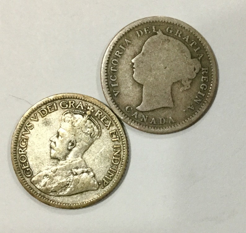 1947 Canada Silver 25 Cent Average Circulated coin for your collection.