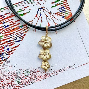 LALAINE Necklace - Matte Cascading Flower Pendant on Leather Cord
