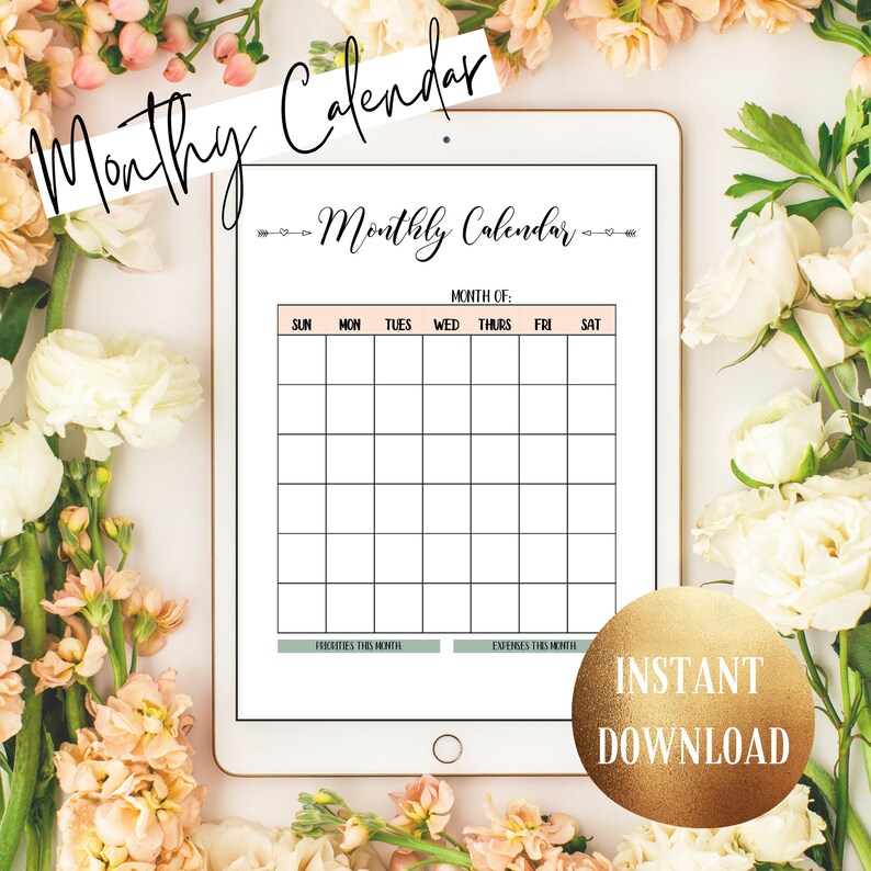 May include: A digital monthly calendar displayed on a tablet, surrounded by flowers. The calendar grid is white with a peach-colored header. Text includes "Monthly Calendar," "Priorities This Month," and "Expenses This Month." A gold circle reads "Instant Download."