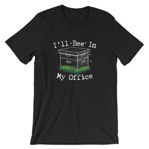 May include: Black t-shirt with a white graphic of a beehive and the text "I'll Bee In My Office".