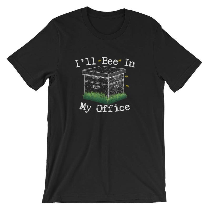 May include: Black t-shirt with a white graphic of a beehive and the text "I'll Bee In My Office".
