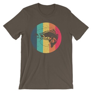 May include: A dark brown t-shirt with a retro-style graphic of a fish on a rainbow background.