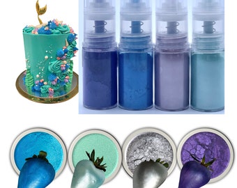May include: Four bottles of edible metallic spray paint in blue, teal, silver, and purple. The bottles are arranged in a row from left to right. The spray paint is perfect for decorating cakes, cookies, and other desserts.