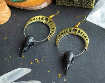 Boucles d'oreilles phases de lune dorée et crâne d'oiseau noir