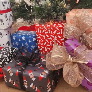 May include: A collection of wrapped gifts with various colorful wrapping paper designs. The gifts are placed under a decorated Christmas tree with gold ribbon and candy canes.