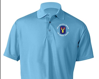 May include: A light blue polo shirt with an embroidered patch featuring the 10th Infantry Brigade's insignia, "The Charger Brigade".