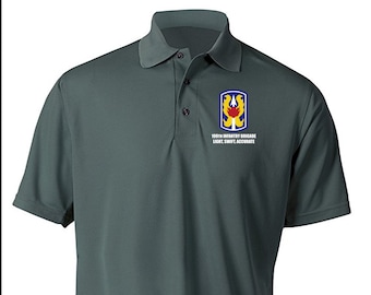 May include: A dark green polo shirt with a small embroidered patch on the right chest. The patch features a yellow, red, and blue design with the text "198th Infantry Brigade Light Swift Accurate".