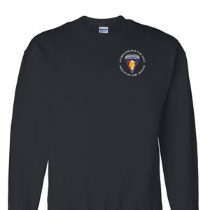 May include: Black sweatshirt with a white embroidered patch on the left chest. The patch features a parachute with a shield and the text "Southern European Task Force United States Army Airborne".