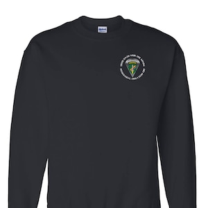 May include: Black sweatshirt with a green, white, and yellow embroidered patch that reads "United States Army Civil Affairs Psychological Operations Command".