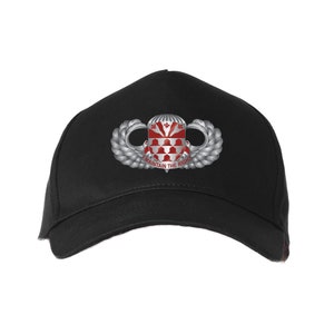 May include: Black baseball cap with a silver and red embroidered patch featuring a parachute and the words "Maintain the Right".