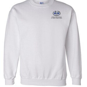 May include: White sweatshirt with a Korean War Veteran U.S. Army Combat Medic patch on the left chest.