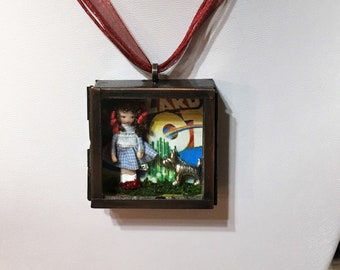 Dorothy Toto Wizard of Oz Ethel Hicks wee doll miniature doll in antique copper box with glass door pendant necklace Kansas tornado