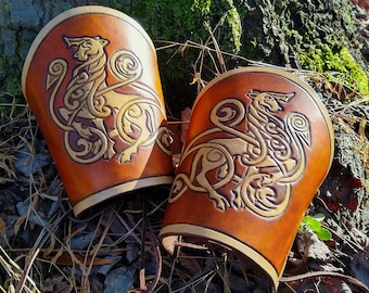 Norse unicorn tooled leather bracers - made to order