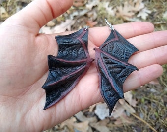 Bat wing leather earrings