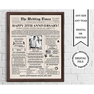 May include: A framed newspaper print celebrating a 25th anniversary. The headline reads "HAPPY 25TH ANNIVERSARY!" with additional text and a black and white photo. The print includes the text "ANY SIZE ANY YEAR DIGITAL OR PRINTED!"