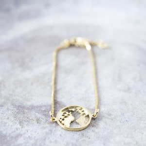 Cadeau minimaliste de bijoux, bracelet globe en or pour l'envie de voyager, bracelet réglable délicat avec breloque carte du monde, bracelet de voyage pour femme