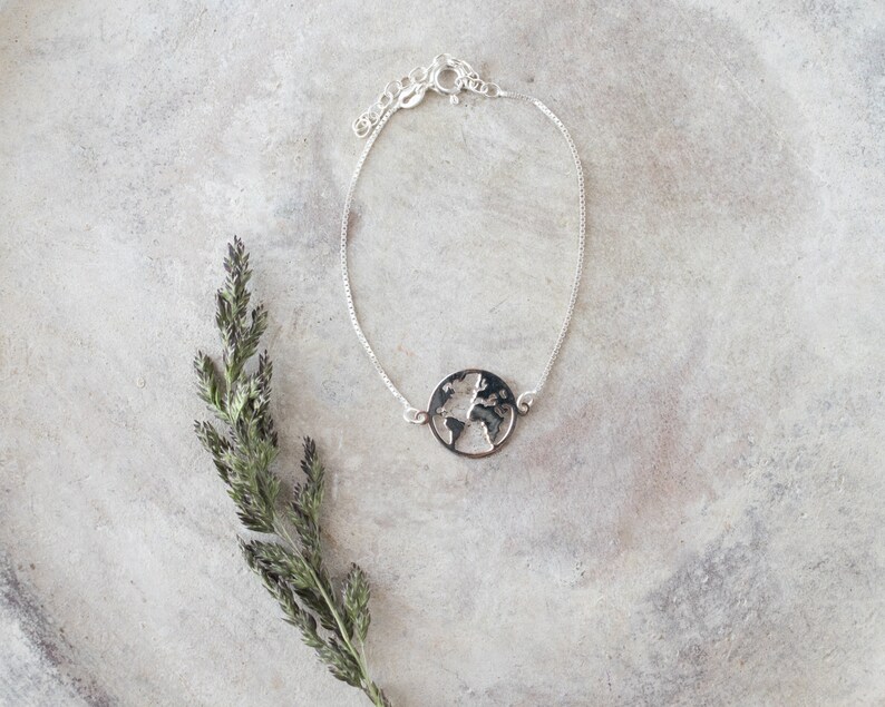 Travel jewelry gifts Delicate adjustable globe bracelet Dainty silver bracelets for women with world map charm Going away gift for her