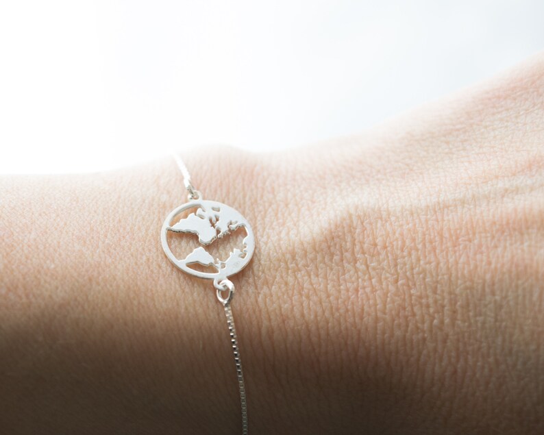 Travel jewelry gifts Delicate adjustable globe bracelet Dainty silver bracelets for women with world map charm Going away gift for her