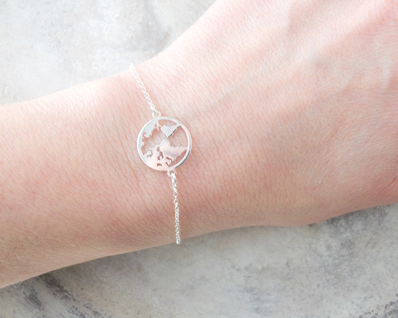 Travel jewelry gifts Delicate adjustable globe bracelet Dainty silver bracelets for women with world map charm Going away gift for her