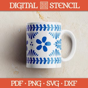 May include: White ceramic mug with a blue floral design. The mug features a large blue flower and other blue floral patterns. The top of the image has the text "DIGITAL STENCIL". The bottom of the image has the text "PDF • PNG • SVG • DXF".