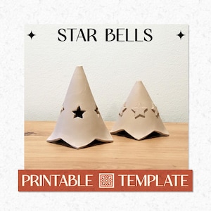 Puede incluir: Dos campanas decorativas beige en forma de cono con recortes de estrellas. Las campanas están sobre una superficie de madera, con el texto "STAR BELLS" y "PRINTABLE TEMPLATE" arriba y abajo.