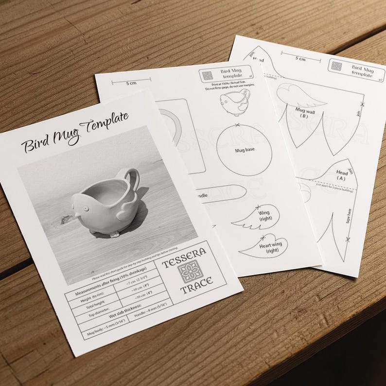 May include: A white paper Bird Mug Template featuring a black and white photograph of a bird-shaped mug, technical line drawings of mug components, and a measurement table listing dimensions in inches and centimeters for the finished ceramic piece.