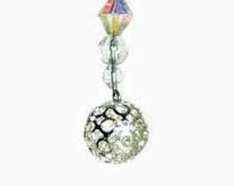 May include: A silver chain with clear and iridescent glass beads, ending with a large, clear, faceted ball.