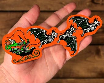 Merry Witchmas Spooky Christmas Vinyl Sticker – Witch Sleigh with Giant Bats – 7" x 3.5" Weatherproof Die Cut