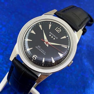 Vintage jaren 60 BENRUS herenhorloge met 3 sterren, zelfopwindende zwarte wijzerplaat, onderhouden en GARANTIE