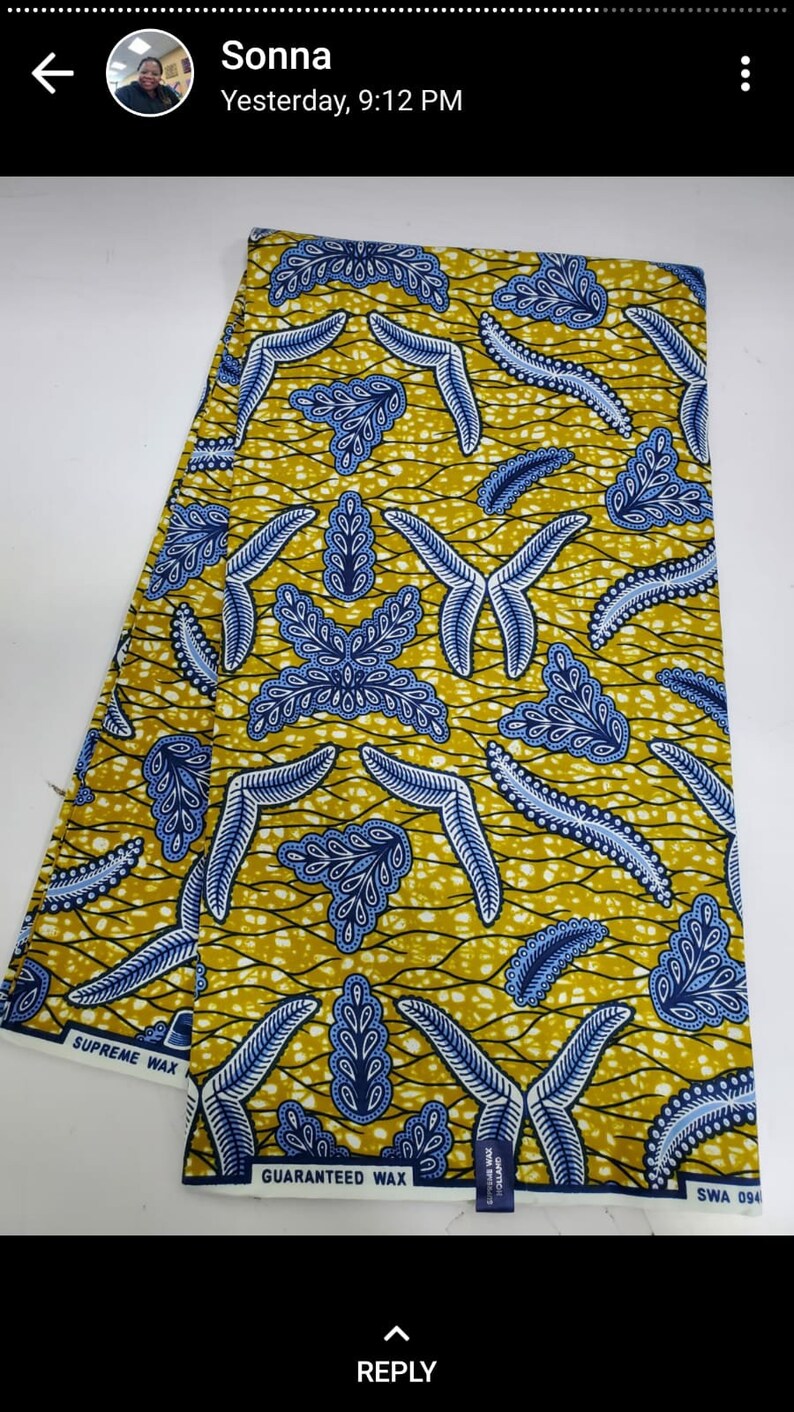 May include: Two pieces of yellow fabric with a blue and white leaf pattern. The fabric is labeled "Supreme Wax" and "Guaranteed Wax".