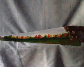 Old hand painted hand saw