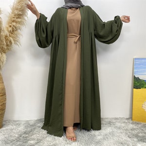 Abaya modesta Khimar: pliegues delanteros y mangas con puños elegantes
