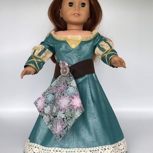 Disney’s Brave princess Merida dress is handmade to fit such dolls as the 18 inch American Girl, Madame Alexander and My Life.