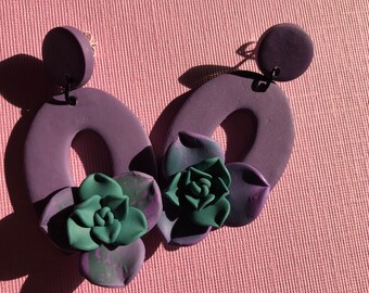 Purple dangle earrings with succulent accent