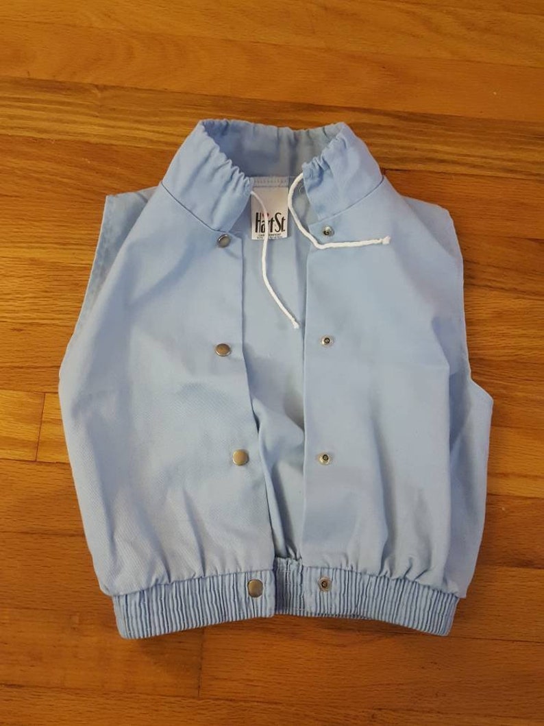 Retro light blue snap button up hoodie-less vest with neck drawstring