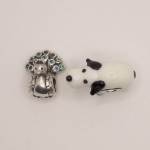 Retired Pandora "Pretty as a Peacock" and "Spotted Puppy" charms