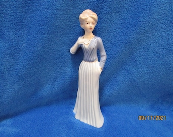Vintage blue lady porcelain figurine