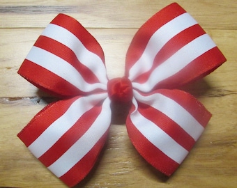 May include: A red and white striped bow with a red center. The bow is made of fabric and has a shiny finish.