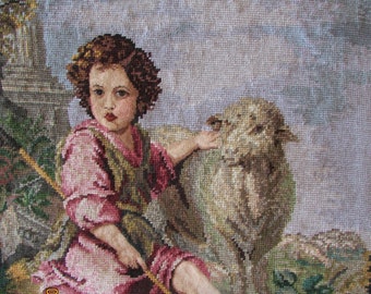 May include: A tapestry depicting a young person in a pink and green outfit, seated and holding a staff, with a sheep. The background features a cloudy sky and foliage, with a classical architectural element on the left.