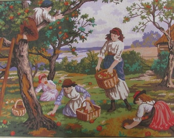 May include: A painting of a group of people picking apples from a tree. There are two women, one man, and a child in the painting. The women are wearing dresses and the man is wearing pants and a shirt. The child is wearing a dress. The people are all smiling and enjoying themselves. The painting is set in a rural setting with a house and a river in the background.