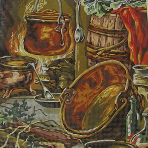 May include: A still life painting of a kitchen scene with copper pots, a wooden barrel, and a cabbage. The pots are on a stove with a fire underneath. There are also some herbs and spices in the scene.