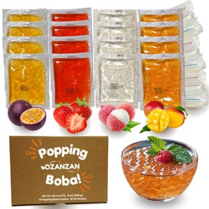 May include: A box of popping boba packets with a variety of flavors, including passion fruit, strawberry, lychee, and mango. The box is brown with the text "Popping SOZANZAN Boba!" and "NET WT. 28.2 oz (1ib, 12 oz) (800g) 16 Popping Boba Packet. 16 Fat Straws". There is a bowl of boba tea with raspberries and mint leaves.