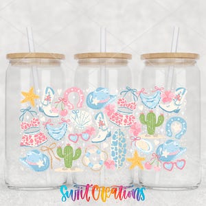 Three glass jars with straws, each containing a colorful illustration of various objects and animals, including stars, cacti, hearts, and other whimsical designs.