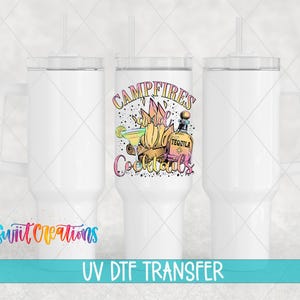 three white tumblers with colorful designs and text, including the phrase "Campfires Cocktails" and a UV DFT Transfer logo.