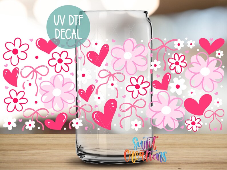 a clear glass jar with a floral pattern and hearts printed on it, along with a UV decal.